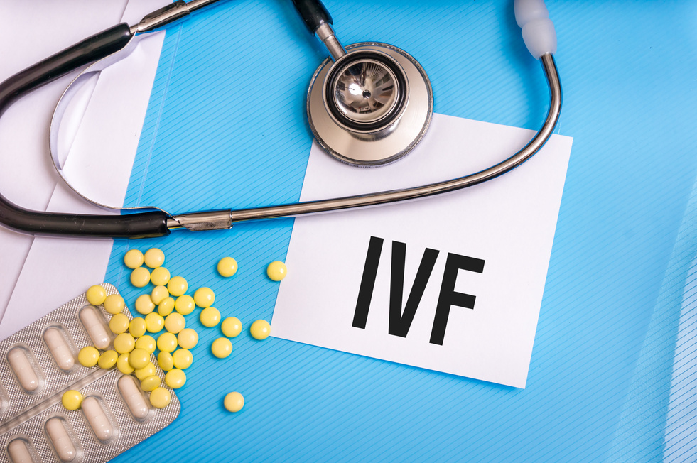 IVF word written on medical blue folder with patient files